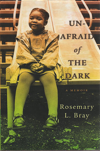 Cover of the book "Unafraid of the Dark: A Memoir" by Rosemary L. Bray. The image features a young girl sitting at the top of a playground slide, wearing a dress, tights, and shoes, with the book title and author's name written beside her in an academic catalog style.